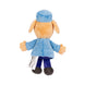 Gros plan sur le visage souriant du jouet peluche Dogman 25cm