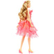 Accessoires inclus : petit sac, collier et barrettes pour cheveux de la poupée Glinda Upland