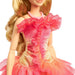 Vue rapprochée du visage de la poupée Glinda avec expression et détails soignés du personnage