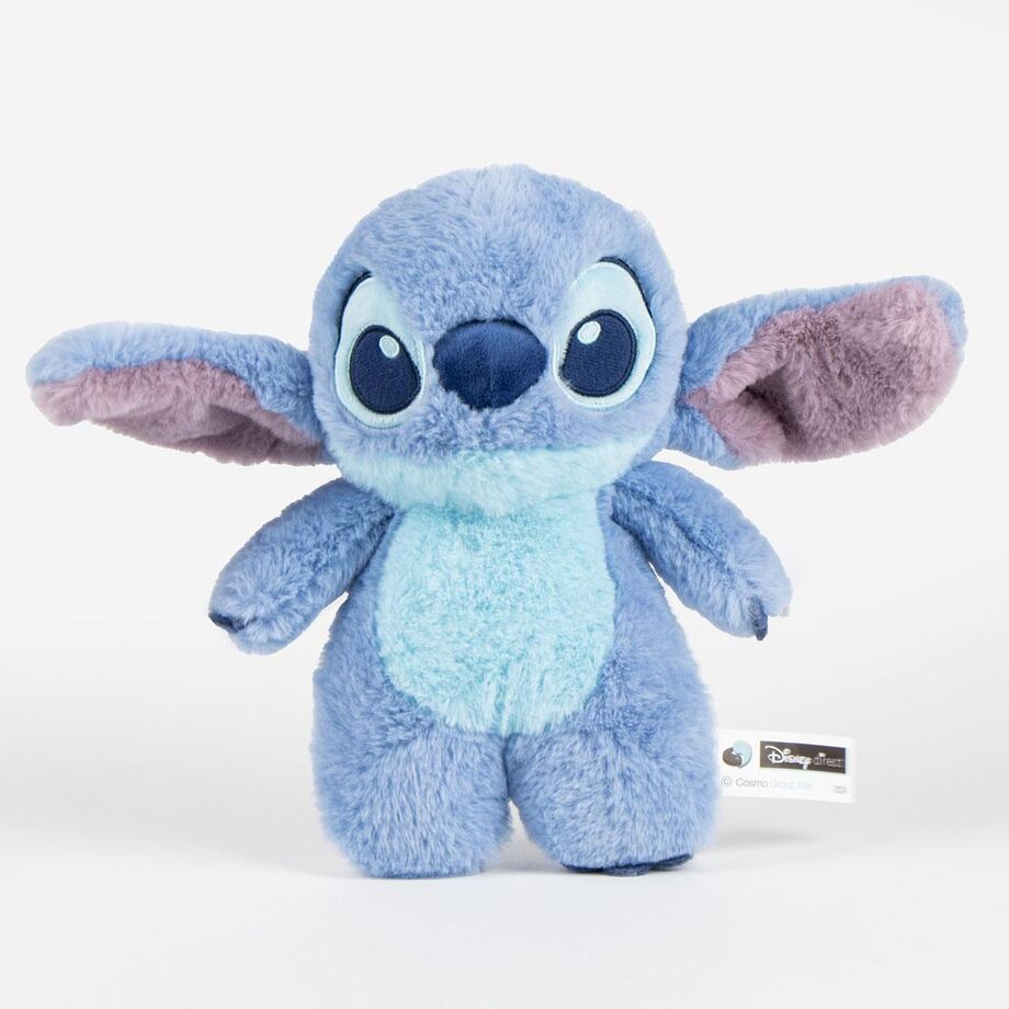 Sac Stitch Disney CERDÁ porté en bandoulière par un enfant souriant en extérieur