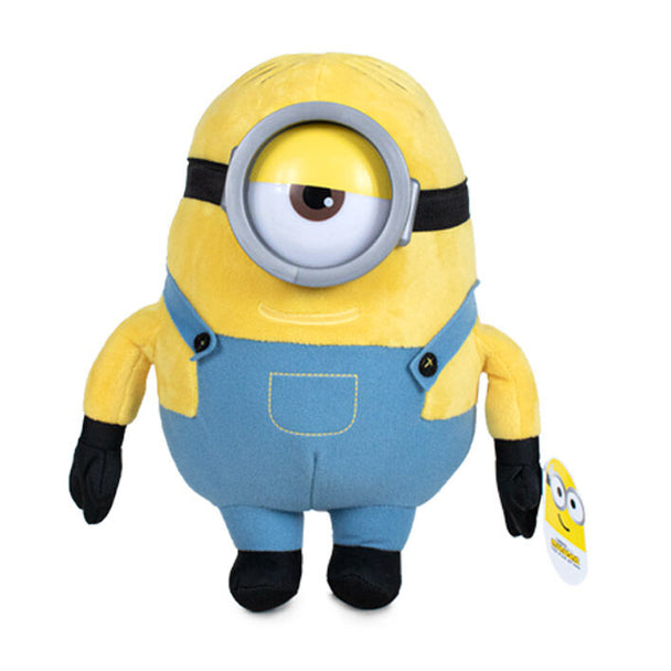 Peluche Minions Stuart de 30cm assise, montrant ses détails en tissu doux et sa tenue caractéristique du film