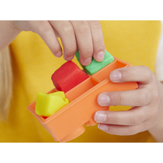 Zoom sur les détails du mixeur Play-Doh montrant la qualité des matériaux