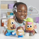 Enfant jouant avec Mr. Potato Head, créant une famille
