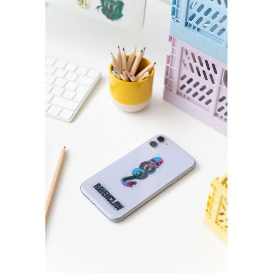 Application d’un sticker Harry Potter sur la couverture d’un carnet, démonstration de réutilisabilité