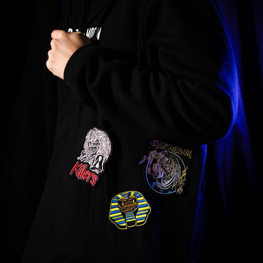 Set complet des 3 écussons Iron Maiden ERIK disposés sur tissu clair