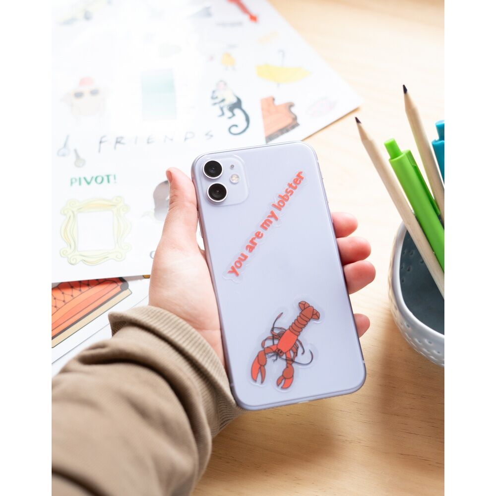 Utilisation créative des autocollants réutilisables Friends ERIK sur un téléphone portable