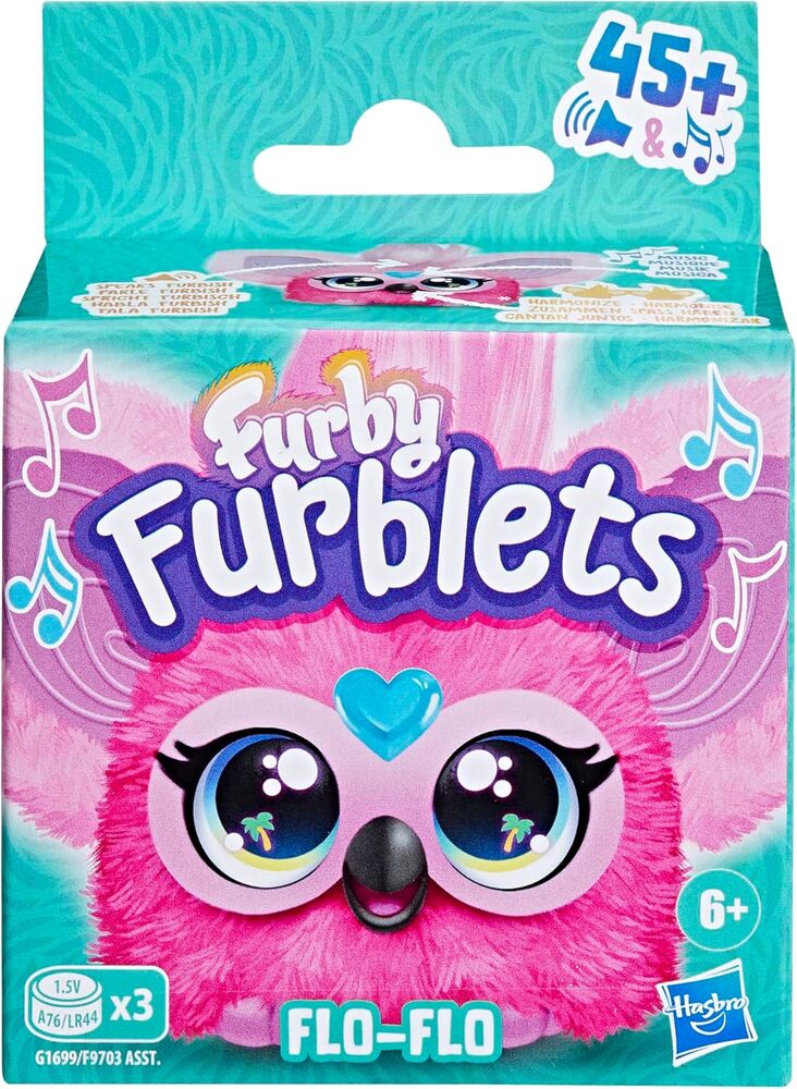 Vue rapprochée du Furblet Flo-Flo Mini Furby montrant son bec et la gemme en forme de cœur pour activer les sons et la musique.