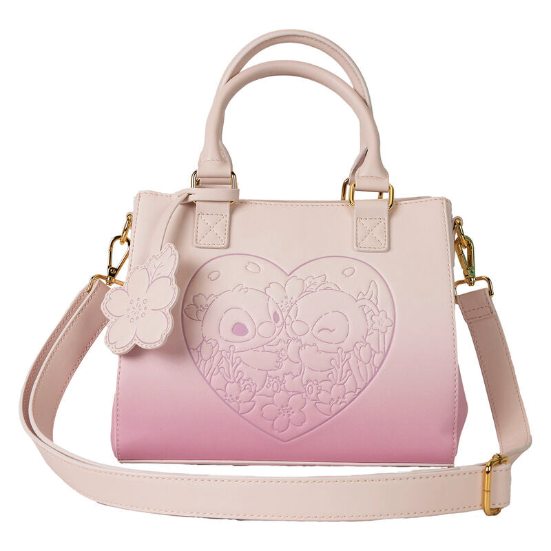 Présentation du sac sur fond blanc, mettant en avant ses détails dorés et son design unique