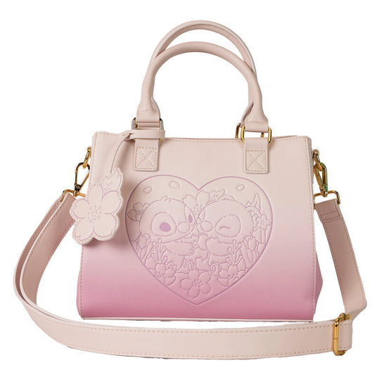 Présentation du sac sur fond blanc, mettant en avant ses détails dorés et son design unique