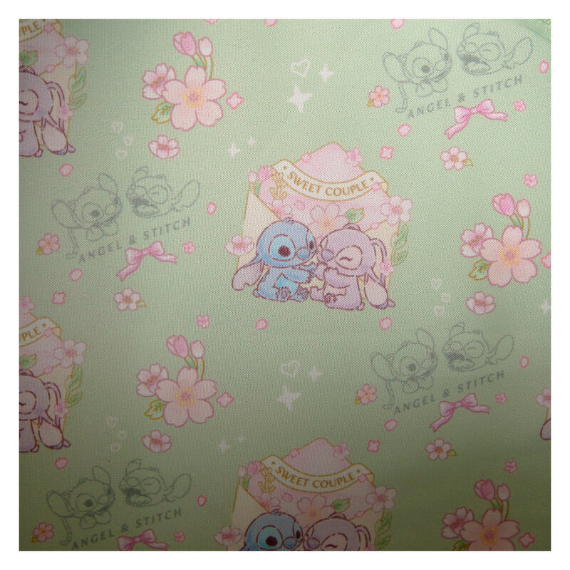 Vue intérieure du sac à dos Loungefly Stitch montrant la doublure assortie rose