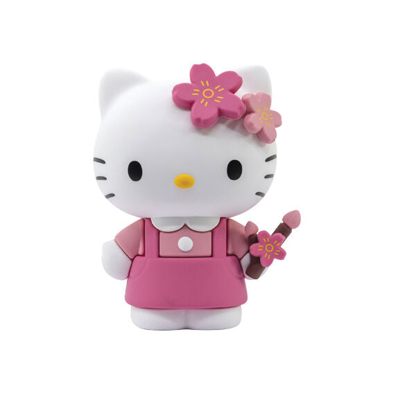 Hello Kitty surprise en PVC, posture assise avec petite peluche