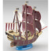 Kit de modélisme BANDAI HOBBY Oro Jackson One Piece avec ses pièces assemblées sur fond blanc.
