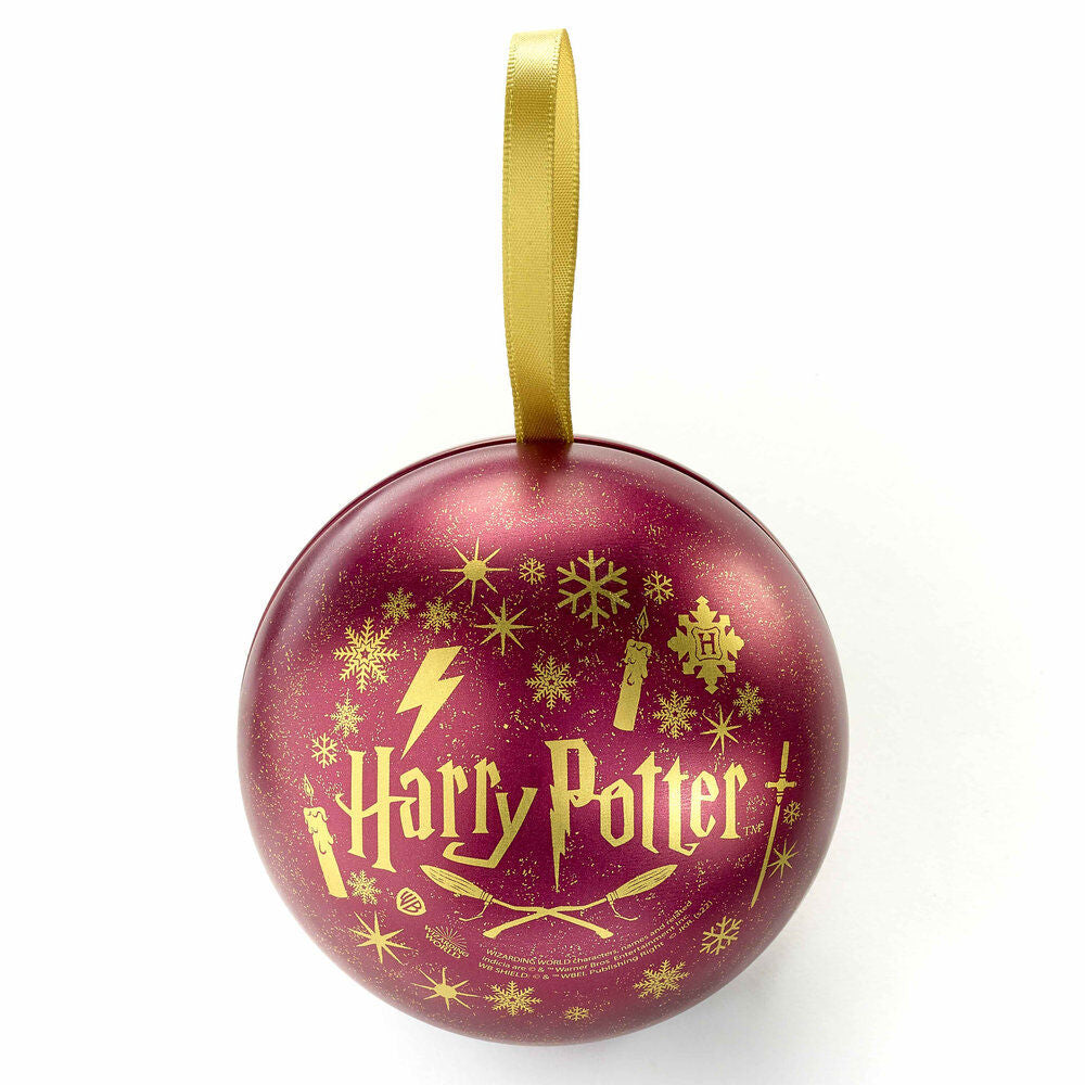 Gros plan de la boule de Noël Gryffondor, montrant les couleurs vives et le design inspiré de la maison Gryffondor de Harry Potter.
