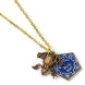 Présentation de la collection THE CARAT SHOP avec le collier Grenouille en Chocolat, badge et porte-clés assortis