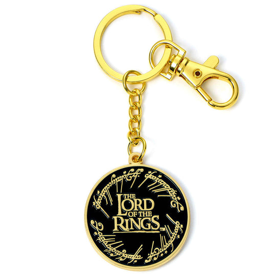 Porte-clés doré avec logo Le Seigneur des Anneaux sur fond blanc, vue rapprochée