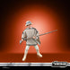 Figurine Luke Skywalker posée dans le Landspeeder pour une scène dynamique