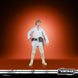 Landspeeder Star Wars avec figurine Luke Skywalker en position de conduite