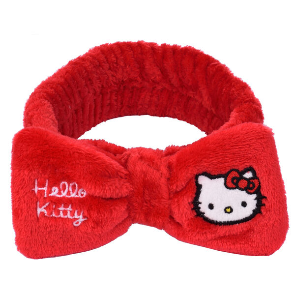 Vue rapprochée du tissu doux et extensible du bandeau Hello Kitty pour soins du visage