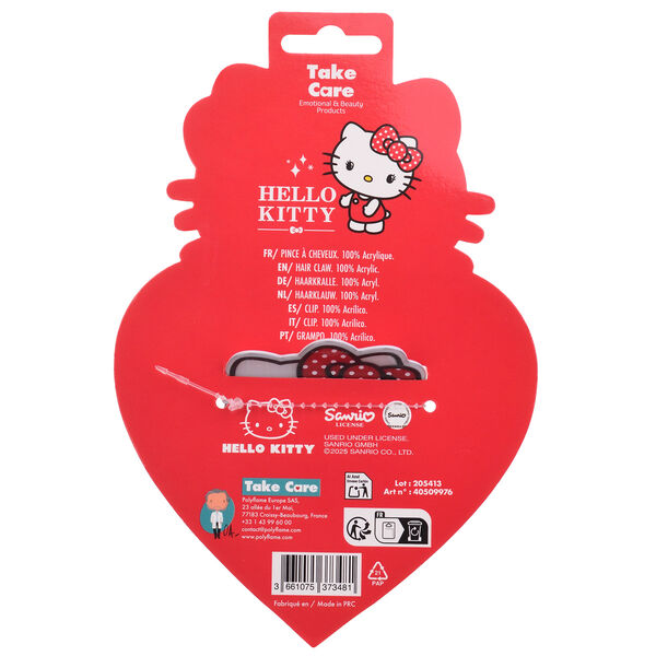 Barrette Hello Kitty portée par une enfant avec un sourire, illustrant son style adorable et pratique