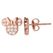 Gros plan sur la finition brillante des boucles d'oreilles Minnie Mouse en or rose