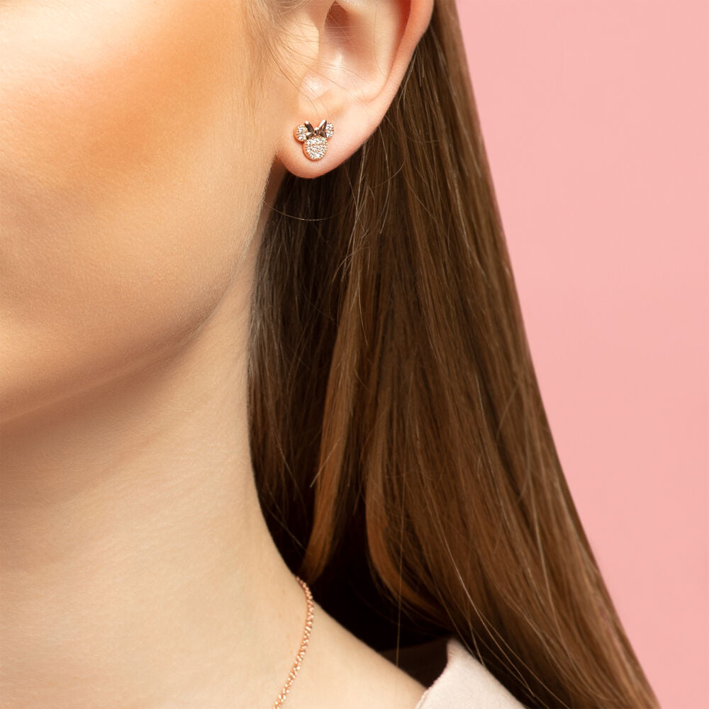 Présentation des quatre images des boucles d'oreilles Minnie Mouse en or rose