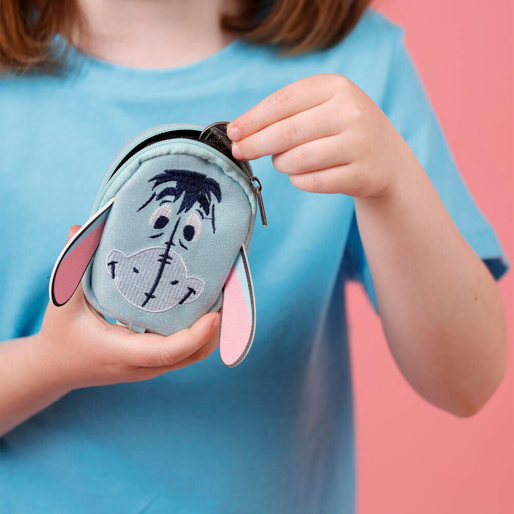 Vue latérale du porte-clés sac à dos Bourriquet Disney montrant le design 3D et les couleurs vives