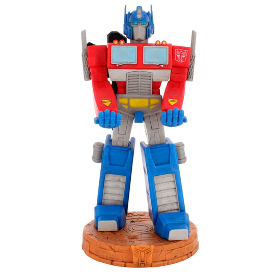 Support Cable Guy Optimus Prime 20cm en position debout sur bureau de gaming