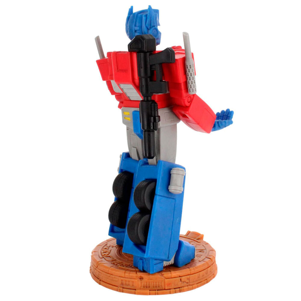 Vue arrière du support Cable Guy Optimus Prime mettant en valeur sa stabilité