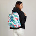 Sac à dos Stitch équipé d'une sangle trolley, idéal pour un transport facile en voyage