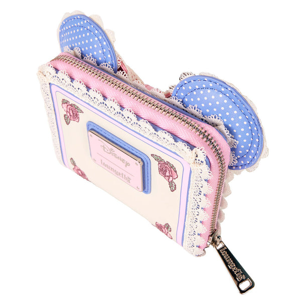 Détail du compartiment zippé argenté et des coutures soignées du portefeuille Minnie Floral Loungefly