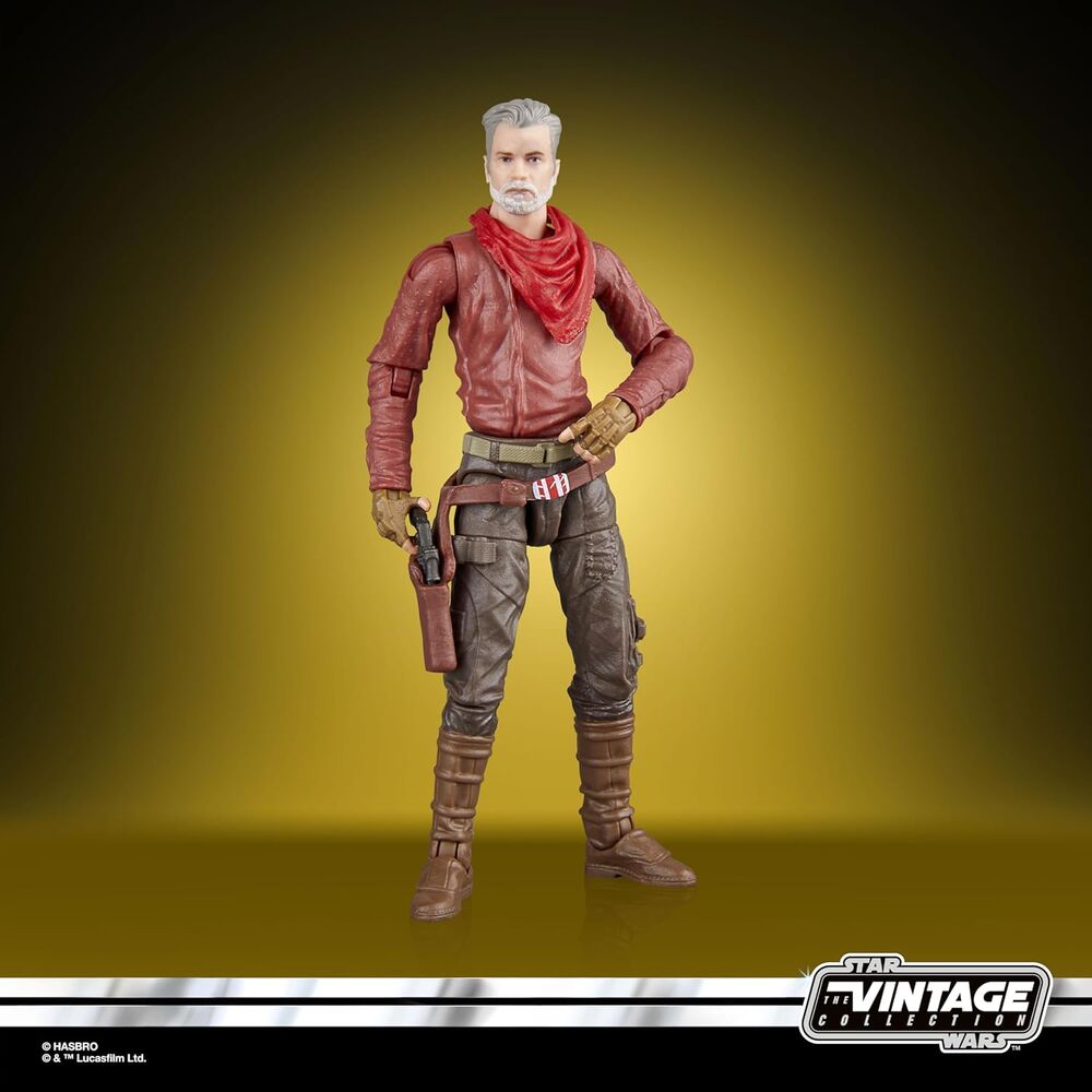 Accessoires inclus : blaster court et blaster long posés à côté de la figurine Cobb Vanth