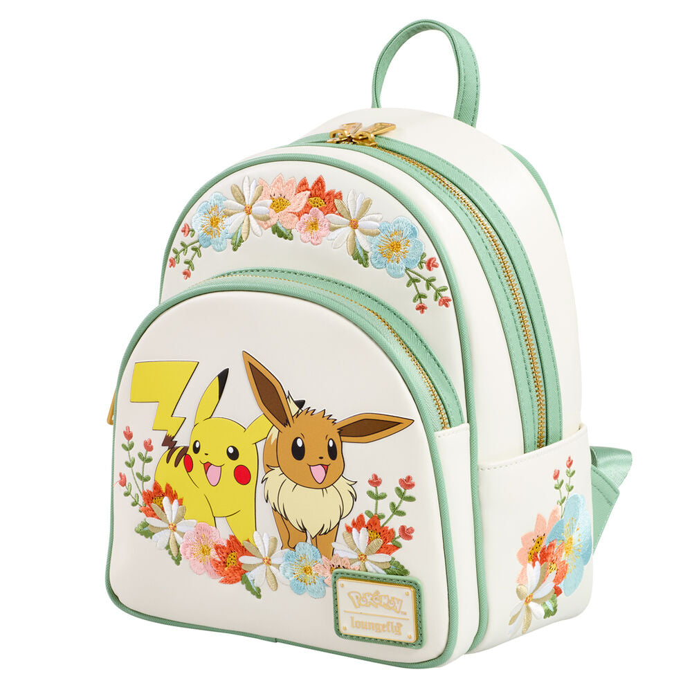 Détail du motif floral entourant les personnages Pikachu et Évoli sur le sac à dos Loungefly