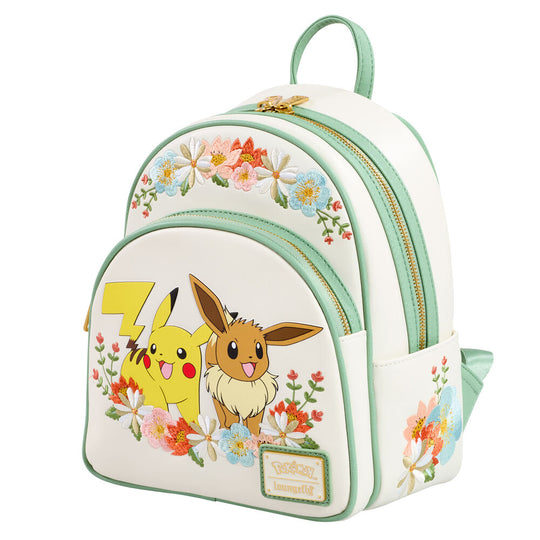 Détail du motif floral entourant les personnages Pikachu et Évoli sur le sac à dos Loungefly