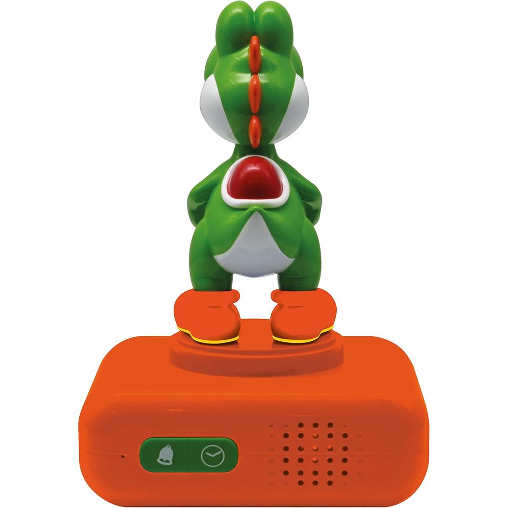 Vue rapprochée du réveil Yoshi avec affichage des heures et boutons de contrôle visibles.