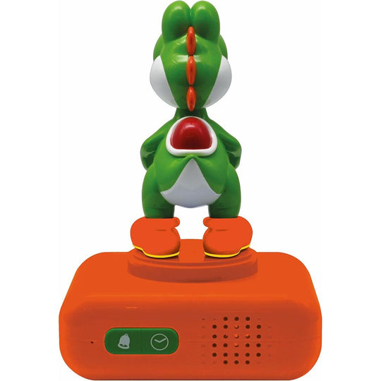 Vue rapprochée du réveil Yoshi avec affichage des heures et boutons de contrôle visibles.