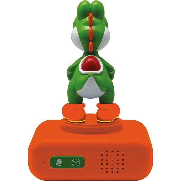 Vue rapprochée du réveil Yoshi avec affichage des heures et boutons de contrôle visibles.
