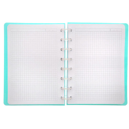 Vue intérieure montrant les 100 feuilles quadrillées du cahier Capibara Bubble Tea A4