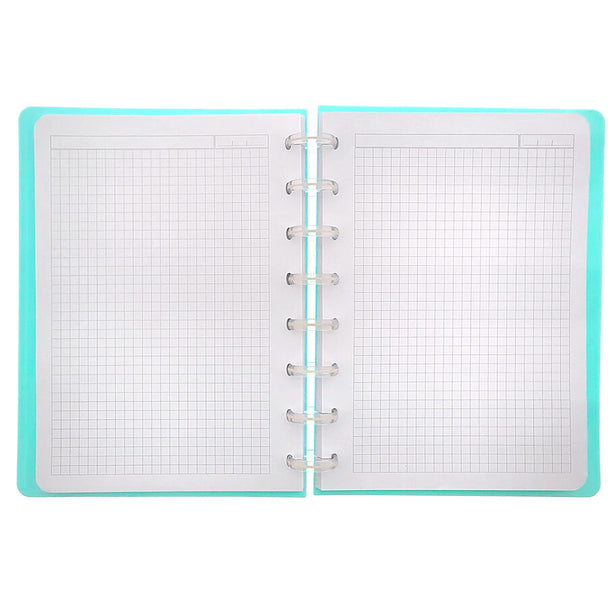 Vue intérieure montrant les 100 feuilles quadrillées du cahier Capibara Bubble Tea A4