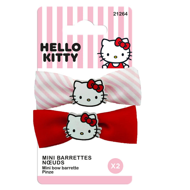 Barrette Hello Kitty rose avec visage du personnage sur fond blanc, vue rapprochée