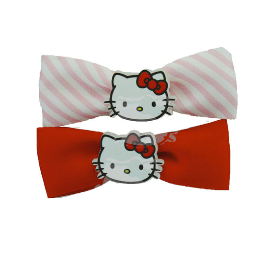 Barrette Hello Kitty avec nœud rouge, mise en scène sur cheveux d'enfant pour démonstration