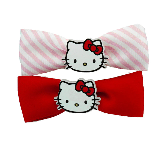 Pack de 2 barrettes Hello Kitty SANRIO posées sur un fond pastel, illustrant les détails colorés