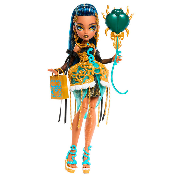 Accessoires inclus : ballon d'anniversaire aux couleurs Monster High