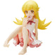 Détail des mains et accessoires de la figurine Shinobu Oshino en gros plan