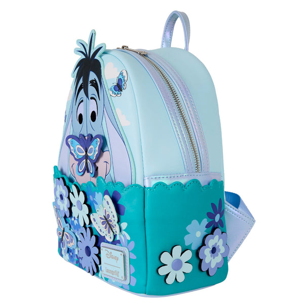 Côté du sac à dos Loungefly Winnie l'Ourson et Bourriquet, mettant en valeur les finitions et la texture du matériau.
