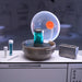 Logo MGA sur l'emballage des capsules surprises Jurassic Park Miniverse