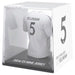 Zoom sur la figurine Bellingham montrant le logo Real Madrid et les détails du t-shirt