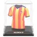 Figurine Valencia CF rétro présentée à côté de son étui biodégradable