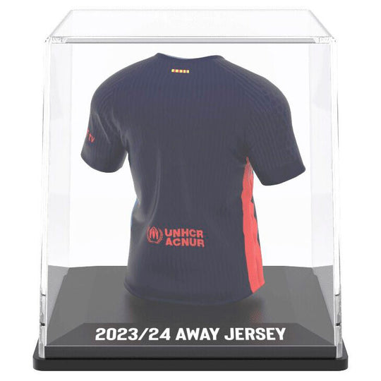 Présentation du mini t-shirt FC Barcelona avec son étui de protection transparent, dimensions compactes