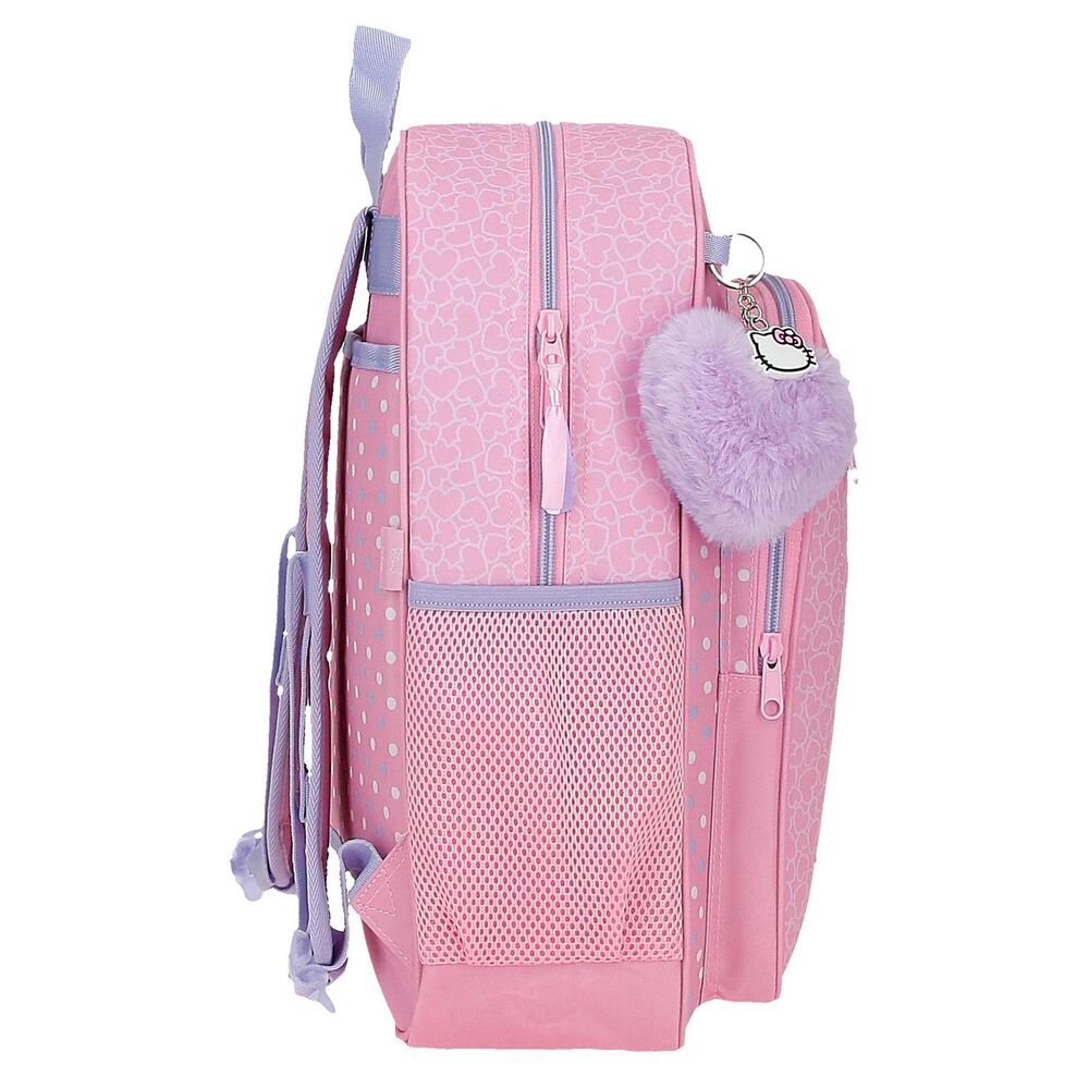 Sac à dos Hello Kitty adaptable trolley posé sur une valise à roulettes
