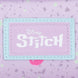 Vue arrière de la trousse double Stitch mettant en avant le design et la texture du tissu